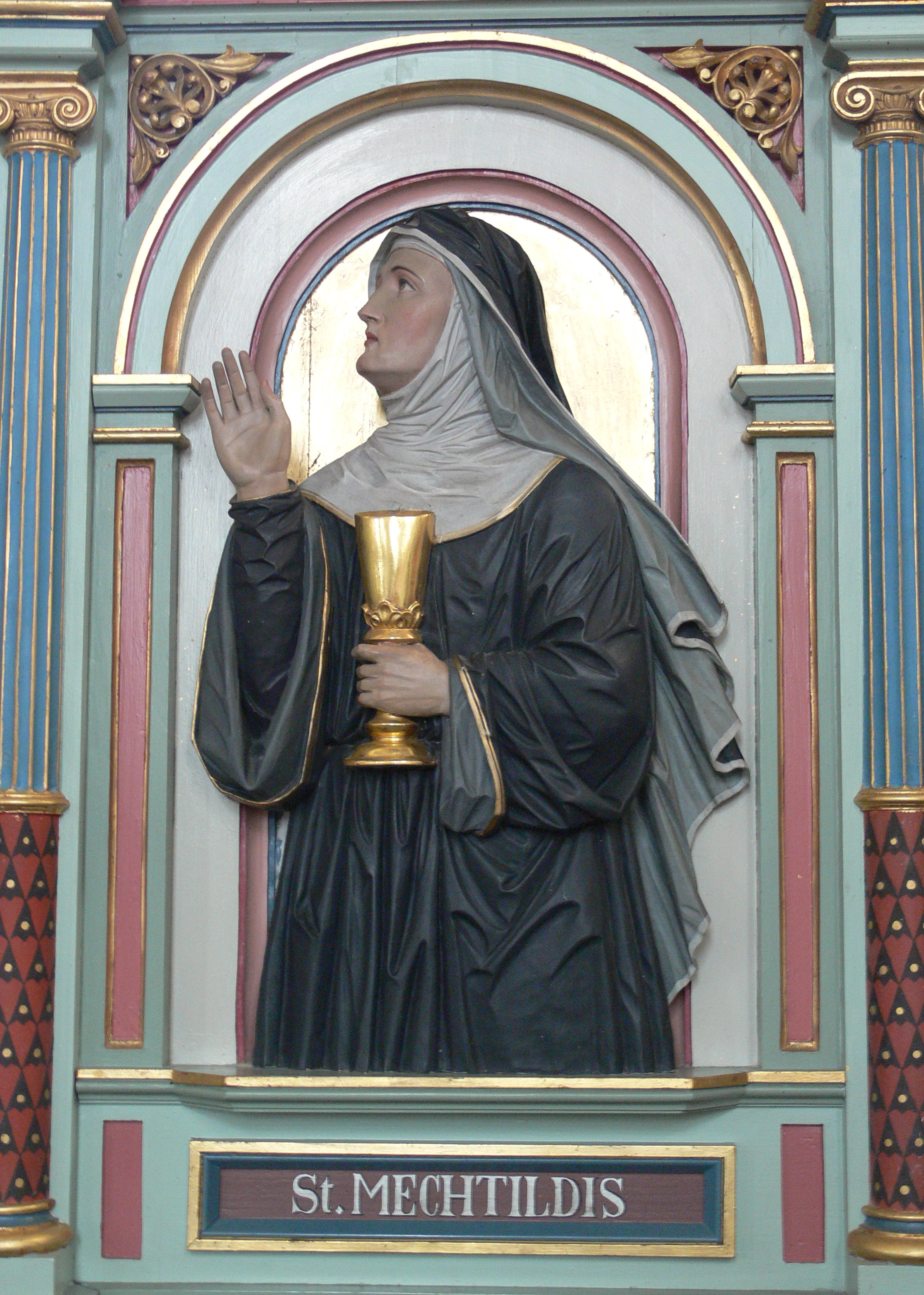 Peter Paul Metz: <em>Mechthild di Magdeburgo</em>, raffigurazione nel coro della chiesa parrocchiale di Merazhofen.<br>
Immagine in pubblico dominio, <a href=https://creativecommons.org/licenses/by/3.0/>CC BY 3.0</a>.