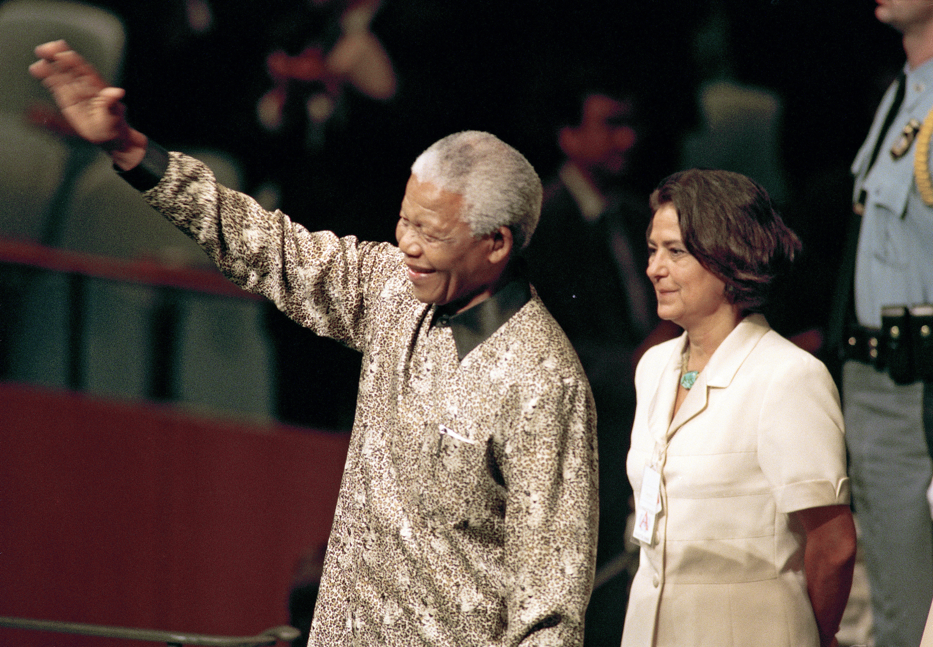 Nelson Mandela (left), President of South Africa, enters General Assembly Hall to address its fifty - third session on 21 September 1998. At his side is United Nations Chief of Protocol, Nadia Younes. - UN Photo/Evan Schneider.